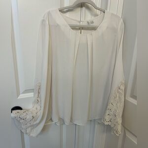 Flowy and feminine white blouse